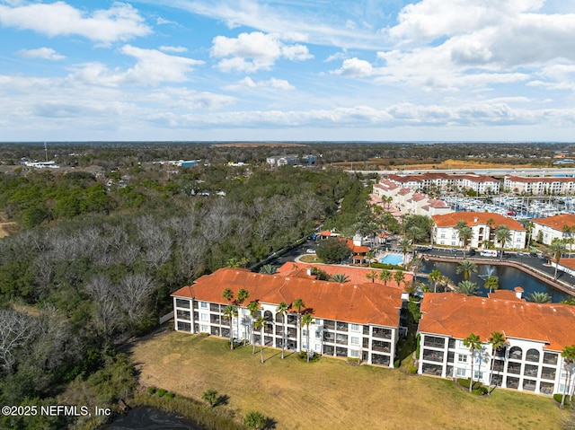 drone / aerial view with a water view