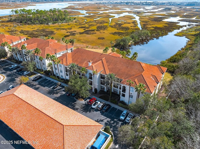 drone / aerial view with a water view