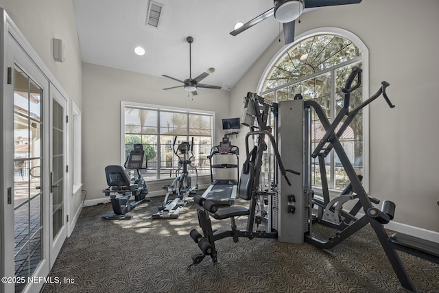 gym with a wealth of natural light, high vaulted ceiling, french doors, and ceiling fan