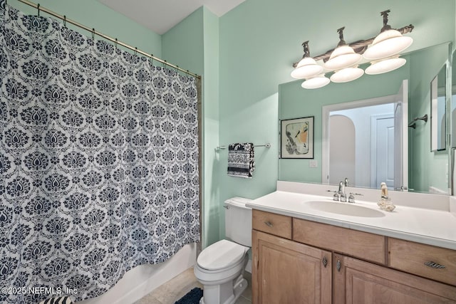 full bathroom with vanity, toilet, and shower / bath combo with shower curtain