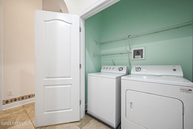 laundry area with washer and clothes dryer