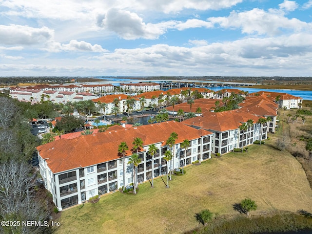 bird's eye view with a water view