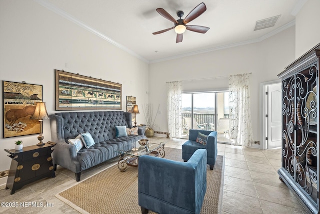 living room featuring crown molding, ceiling fan, and light tile patterned flooring