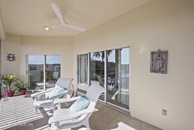 view of patio featuring ceiling fan