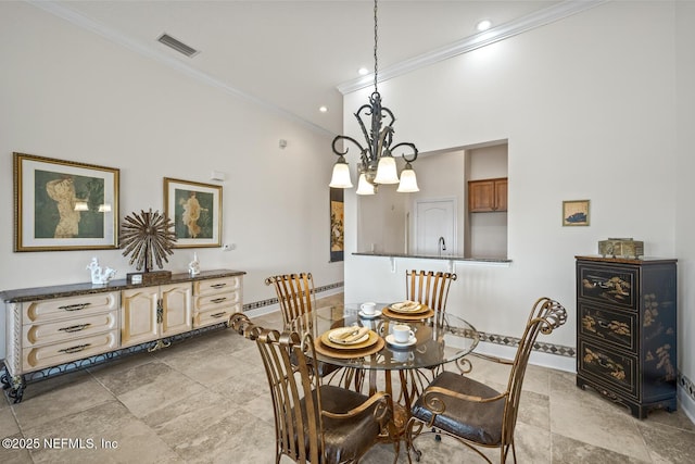 dining area with crown molding