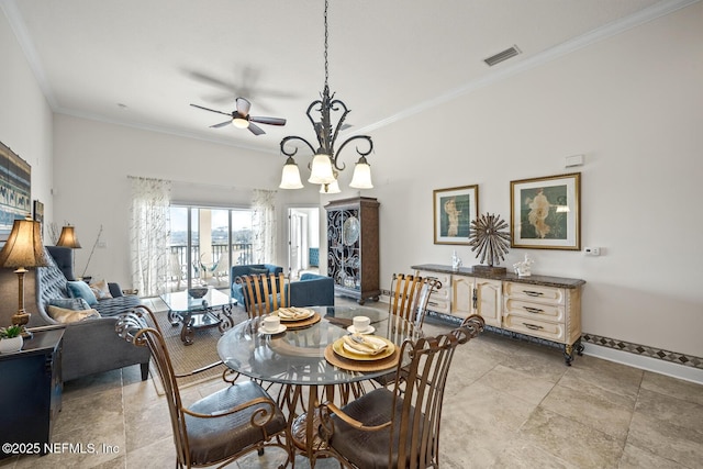 dining space featuring crown molding and ceiling fan