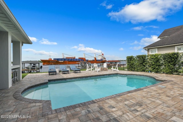 view of pool featuring a patio