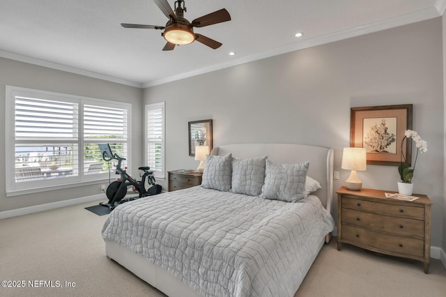 bedroom with ceiling fan, ornamental molding, and light colored carpet