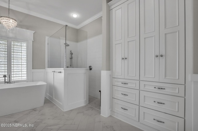 bathroom featuring crown molding, shower with separate bathtub, and an inviting chandelier