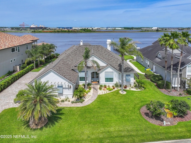 drone / aerial view with a water view