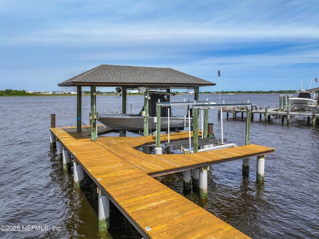 view of dock with a water view