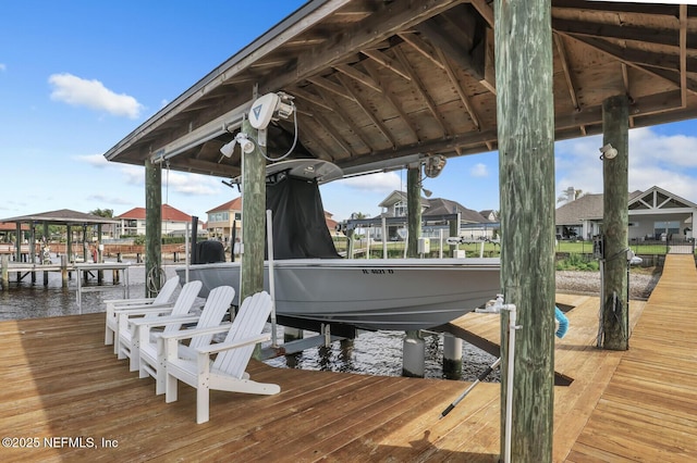 view of dock with a water view