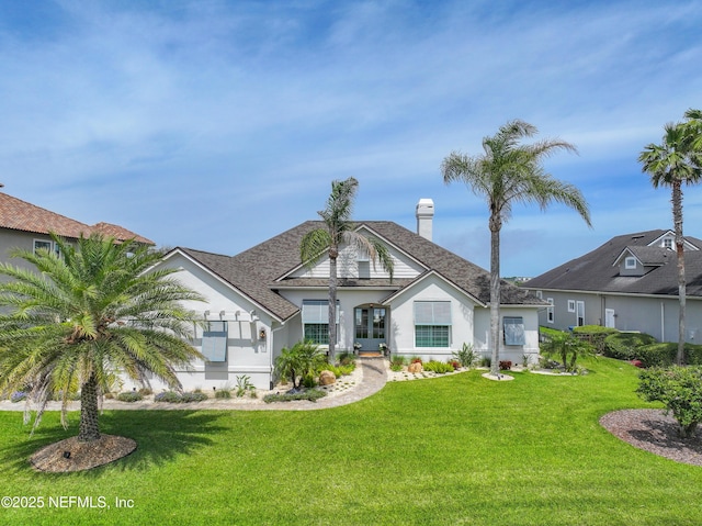 view of front of home featuring a front yard