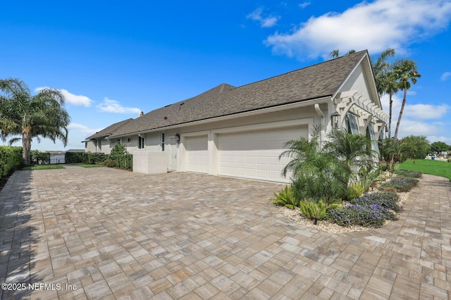 view of property exterior featuring a garage