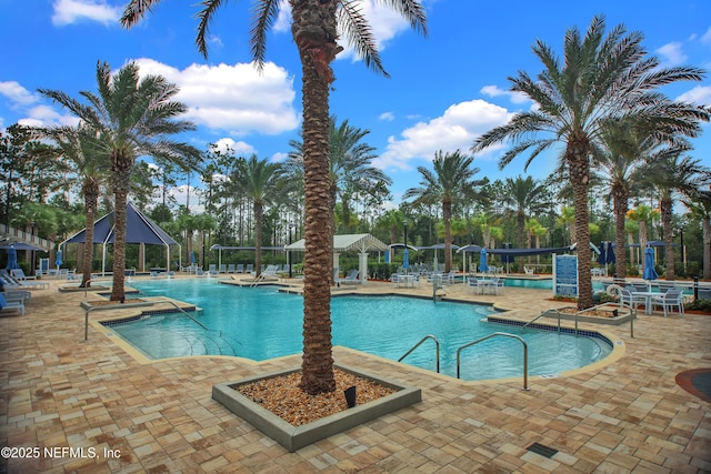 view of pool featuring a gazebo and a patio