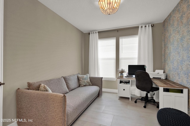 office space with vaulted ceiling and light tile patterned flooring