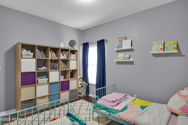 bedroom with a textured ceiling