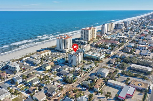 aerial view with a view of the beach and a water view