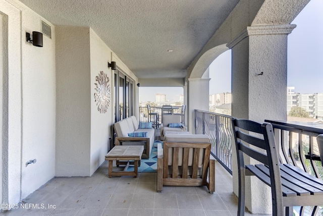 balcony featuring outdoor lounge area