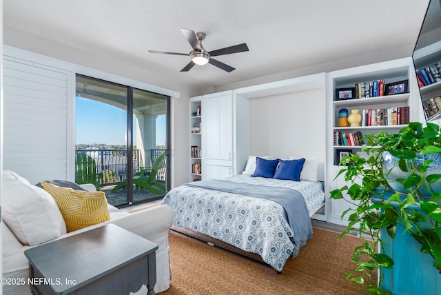 bedroom featuring ceiling fan and access to outside