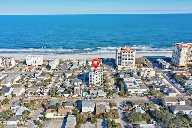 aerial view with a view of the beach and a water view