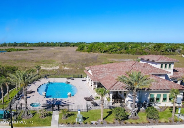 view of swimming pool with a patio