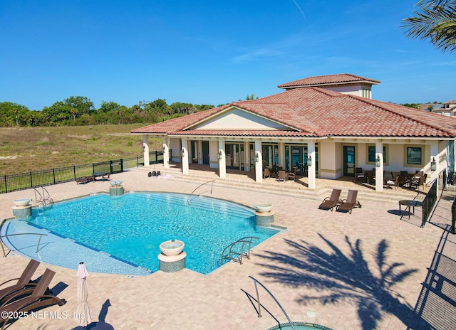 view of pool featuring a patio area