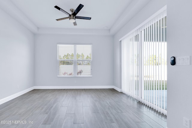 unfurnished room featuring ceiling fan