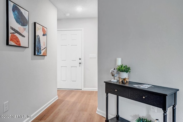 hall featuring hardwood / wood-style floors