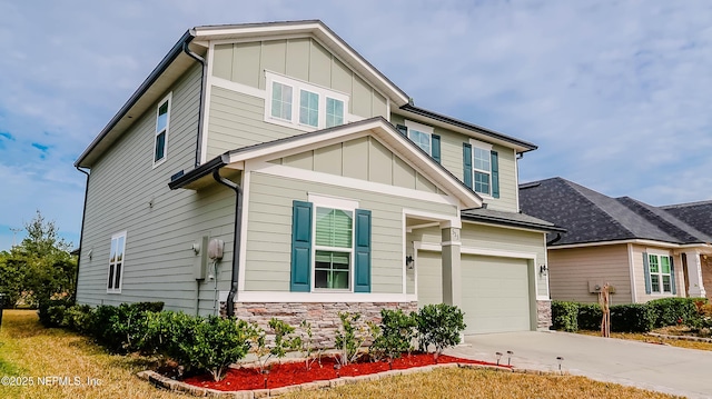 craftsman house with a garage