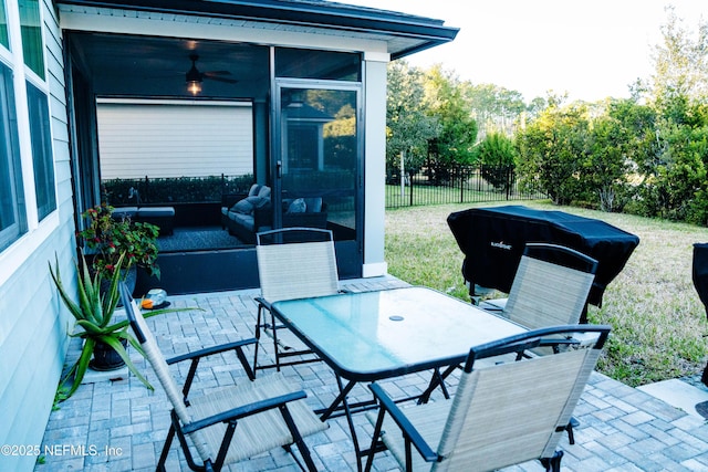 view of patio / terrace featuring ceiling fan