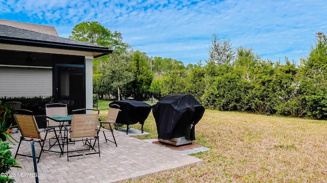 view of patio with a grill