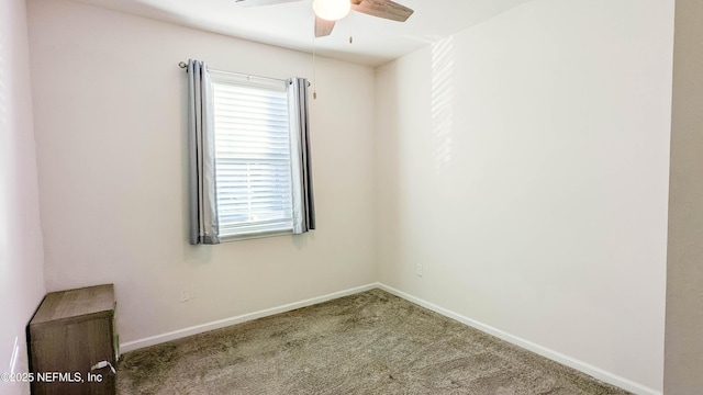 carpeted empty room with ceiling fan