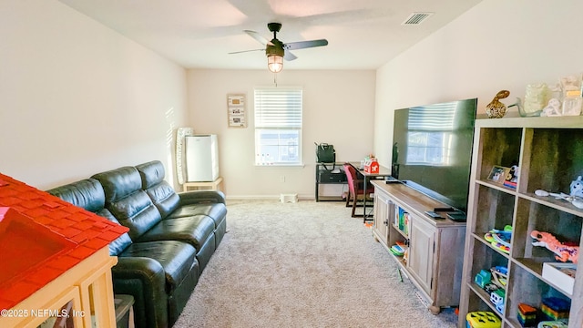 living room with carpet flooring and ceiling fan