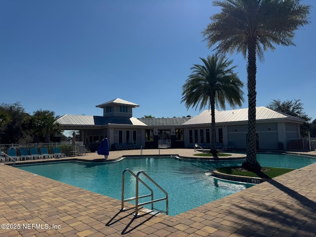 view of swimming pool featuring a patio