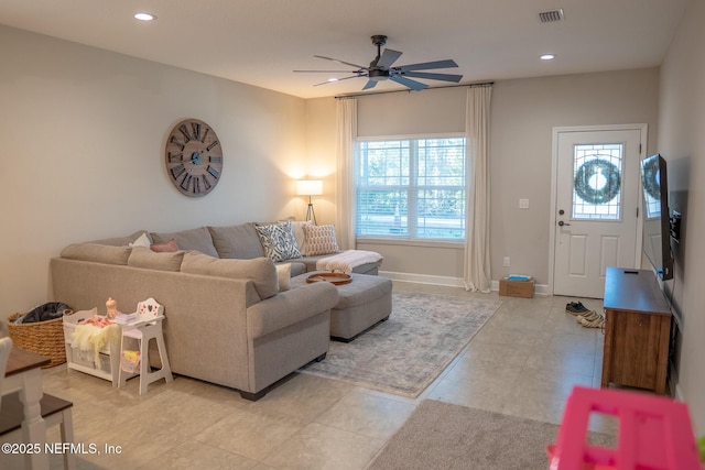 living room featuring ceiling fan