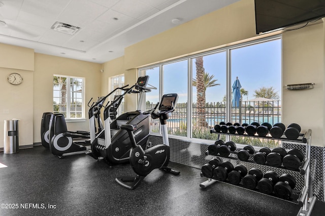 workout area with a drop ceiling