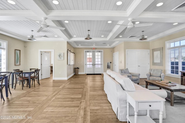 living room featuring crown molding, ceiling fan, and french doors