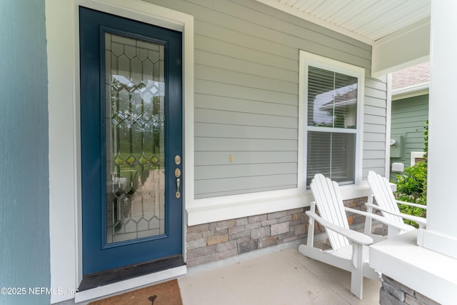 entrance to property with a porch