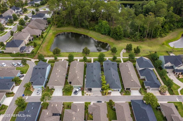 drone / aerial view featuring a water view