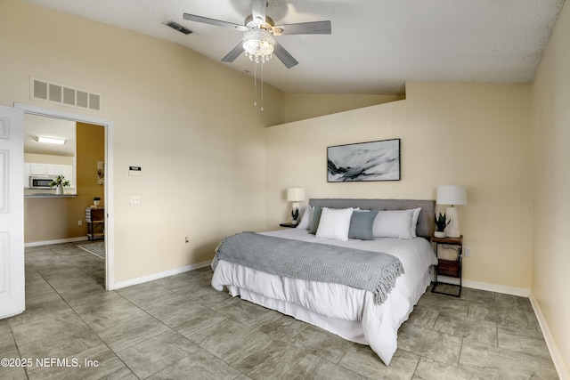 bedroom with lofted ceiling and ceiling fan