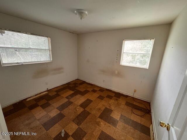 spare room with a wealth of natural light