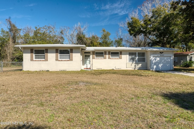 ranch-style home with a garage and a front lawn