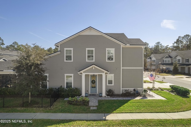 view of front facade with a front yard