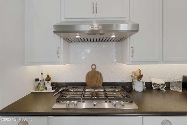 kitchen featuring white cabinetry, ventilation hood, and stainless steel gas cooktop