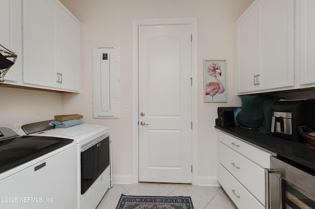 washroom featuring cabinets, separate washer and dryer, light tile patterned floors, electric panel, and beverage cooler