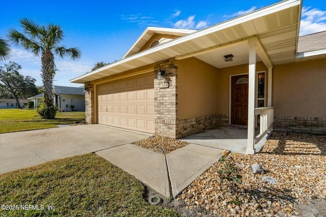 view of side of property featuring a garage