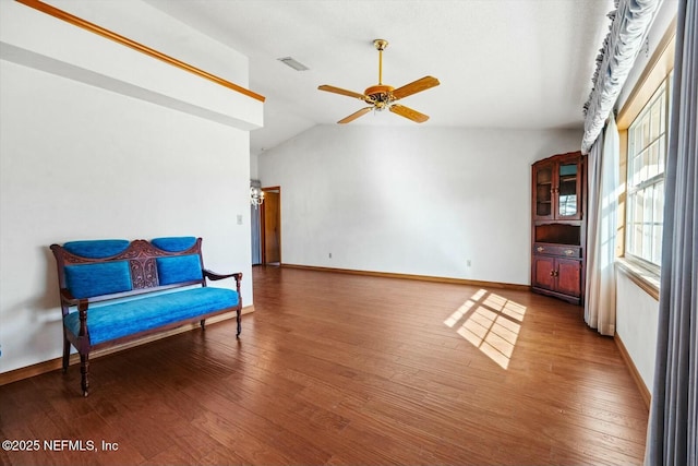 sitting room featuring lofted ceiling, hardwood / wood-style flooring, and ceiling fan