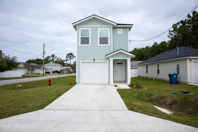 front facade with a garage and a front yard