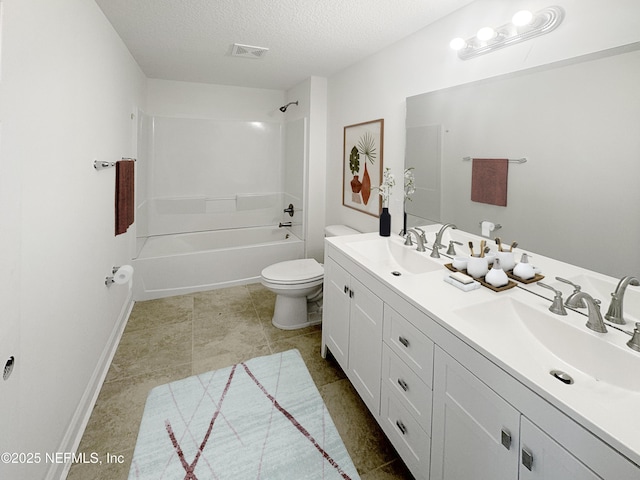 full bathroom with vanity, shower / bathtub combination, a textured ceiling, and toilet